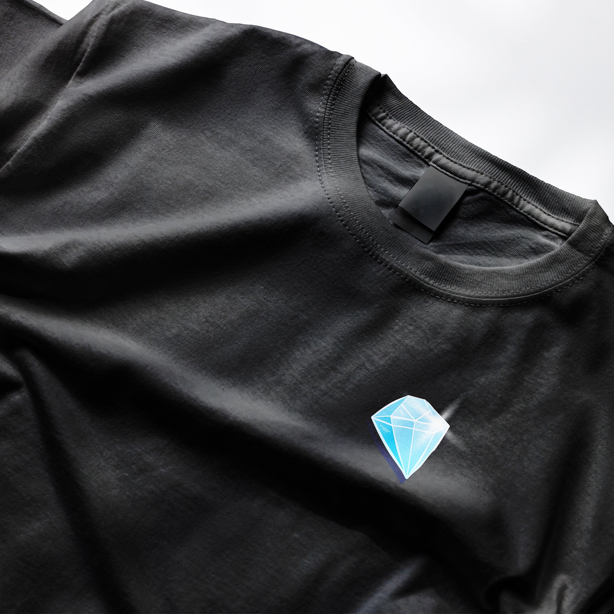 Black t-shirt with a blue diamond logo on a white background from Clothing Dioxide, UK